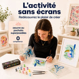 Femme réalisant un tableau toucan Panash Art avec pochoirs superposables et peinture acrylique, activité créative sans écrans alternative à la peinture au numéro